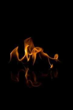 Flames with a black background. Close up. Stock Photos