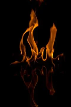 Flames with a black background. Close up. Stock Photos