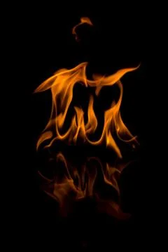 Flames with a black background. Close up. Stock Photos