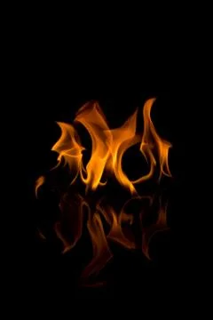 Flames with a black background. Close up. Stock Photos