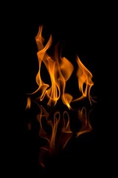Flames with a black background. Close up. Stock Photos