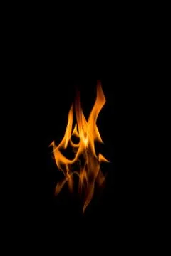 Flames with a black background. Close up. Stock Photos