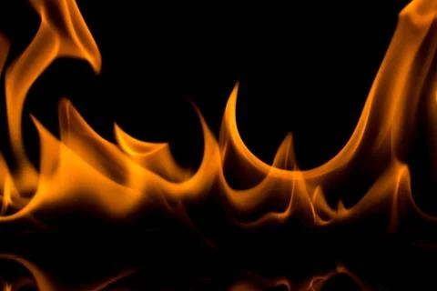 Flames with a black background. Close up. Stock Photos