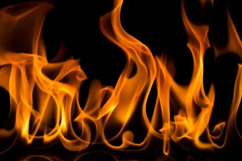 Flames with a black background. Close up. Stock Photos