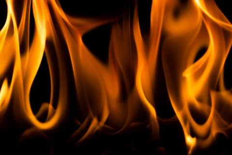 Flames with a black background. Close up. Stock Photos