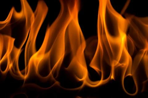 Flames with a black background. Close up. Stock Photos