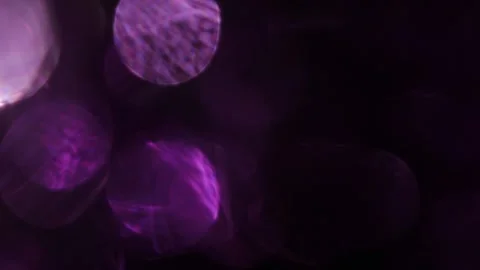 Flames of bright purple light on the left in the blackness Stock-Footage 318946827