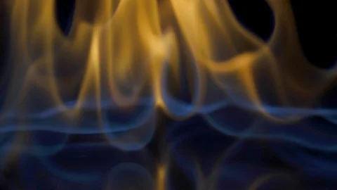 Flames burn on the mirror surface on a black background Stock Footage 100604979