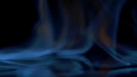 Flames burn on the mirror surface on a black background Stock Footage 100605258