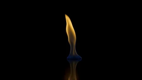 Flames burn on the mirror surface on a black background Stock Footage 100605558