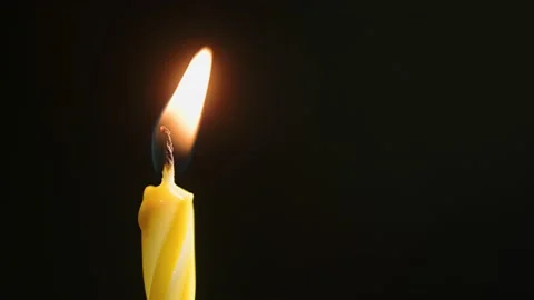 Flames burning in the dark candle macro, Close-up against a dark background Stock Footage 172080317