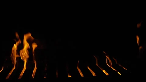 Flames Burning on Empty BBQ Grill Grate at Night Stock Footage 346175728