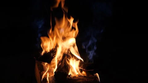 The flames of a burning fire at night Stock Footage 285875368