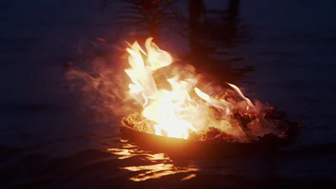 Flames Burning in a Floating basket Stock Footage 270327638
