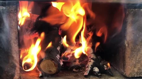 Flames from burning logs in a fireplace Stock Footage 315642375