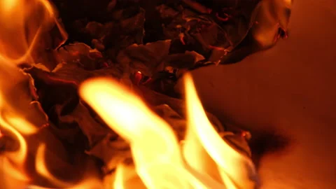 Flames on a burning silver cross blazing in the night. Stock Footage 232439106