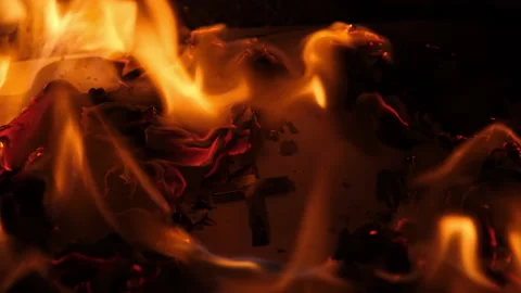 Flames on a burning silver cross blazing in the night. Stock Footage 232439873