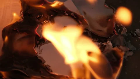 Flames on a burning silver cross blazing in the night. Stock Footage 232440180
