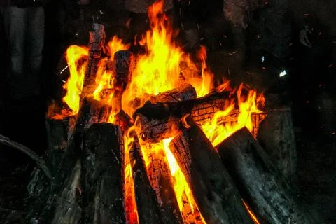 Flames of the campfire in the night. Stock Photos