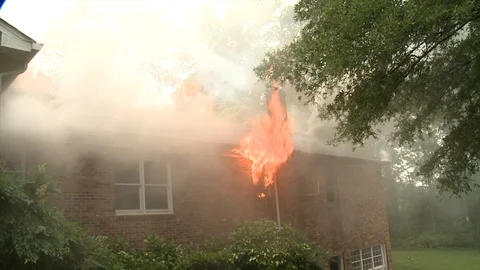 FLAMES COMING OUT FROM WINDOW Stock Footage 93402366