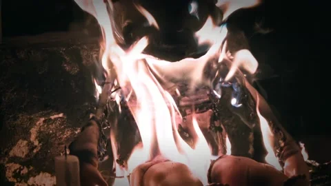 Flames consuming a baby doll Stock-Footage 157738802