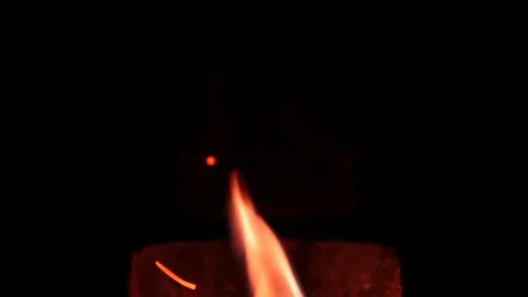 The flames dance in the crucible of a stove Stock Footage 84823716