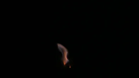 The flames dance in the crucible of a stove Stock Footage 84828175