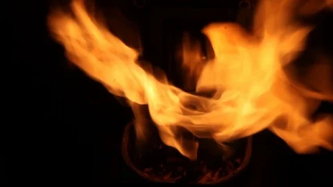 The flames dance in the crucible of a stove Stock Footage 84846323