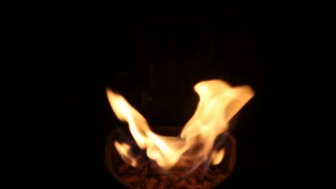 The flames dance in the crucible of a stove Stock Footage 84847295