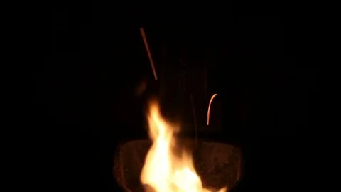The flames dance in the crucible of a stove Stock Footage 84854068