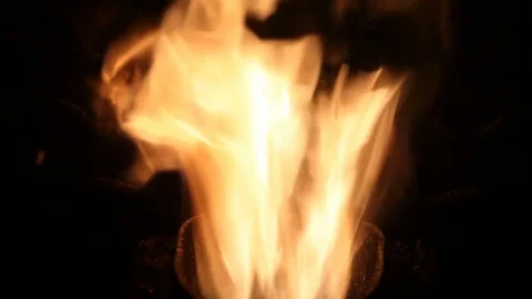 The flames dance in the crucible of a stove Stock Footage 84897198