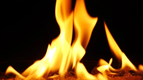 Flames dance in the dark during a cozy evening gathering Stock Footage 281816433