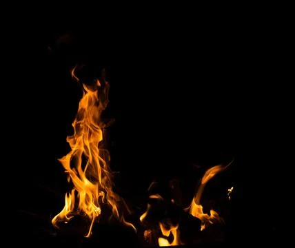 Flames  on a dark background Stock Photos