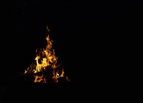 Flames  on a dark background Stock Photos