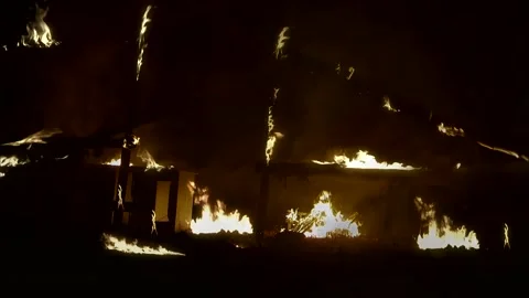 Flames engulf the building Stock Footage 261511873