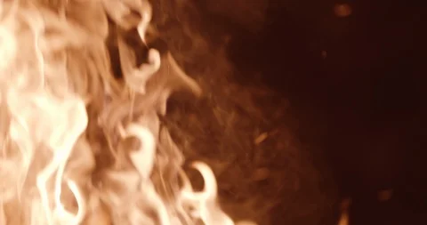 Flames fill frame left with sparks and smoke Stock Footage 102786841
