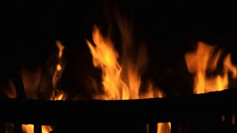 Flames in fire basket by night Stock Footage 122824292