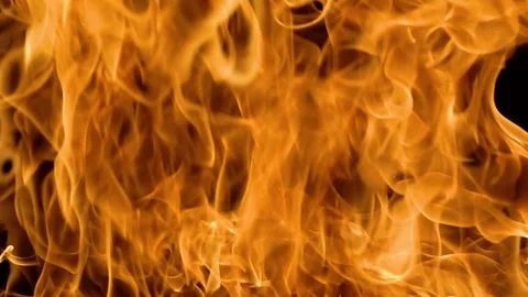 Flames of fire on black background in slow motion Video stock 70963207