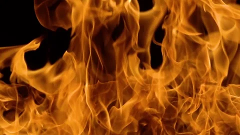 Flames of Fire on Black Background in Slow Motion Stock Footage 303051760