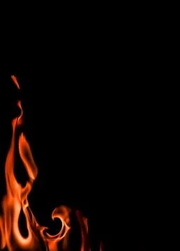 Flames of fire on a black background. Space for copy, text, your words. Verti Stock Photos