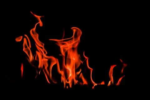 Flames of fire on a black background. Space for copy, text, your words Stock Photos