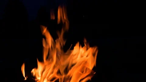 Flames of fire from burning coals in the grill late at night. Stock-Footage 99651758