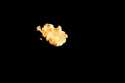 Flames of fire on dark background Stock Photos