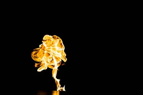 Flames of fire on dark background Stock-Fotos