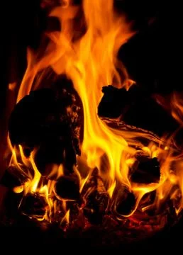 Flames of fire in a fireplace Stock Photos