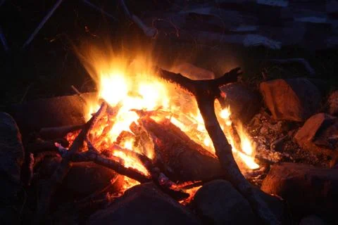 Flames from a fire glowing orange Stock Photos