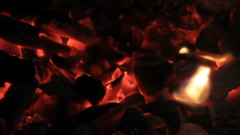 Flames flutter over hot coals Stock Footage 171369171