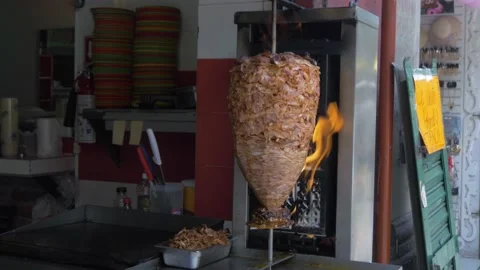 Flames Hitting Al Pastor At Taco Shop In Mexico City Stock Footage 154644614