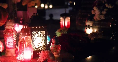 Flames of hundreds of lantern candle lights glowing in the dark on the Remembran Stock Footage 169257252