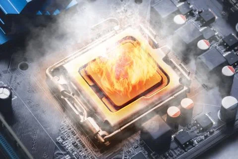 Flames ignite the computer processors on the motherboard Stock-Fotos